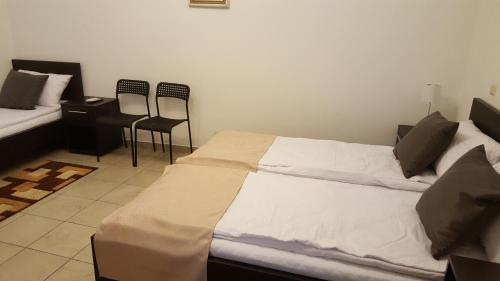 Ένα ή περισσότερα κρεβάτια σε δωμάτιο στο Vis A Vis Studio