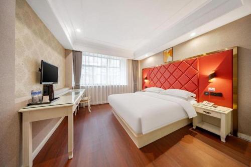 Letto o letti in una camera di mingjia hotel