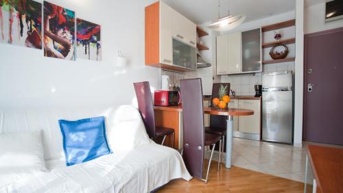 Kuchyň nebo kuchyňský kout v ubytování Apartment Di Anima
