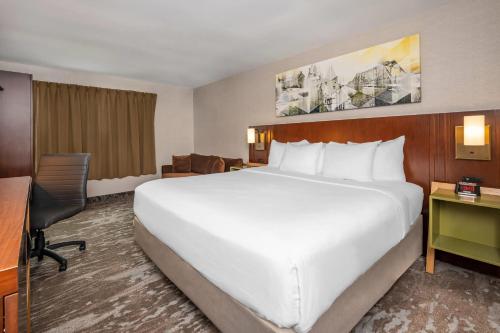Ένα ή περισσότερα κρεβάτια σε δωμάτιο στο Comfort Inn
