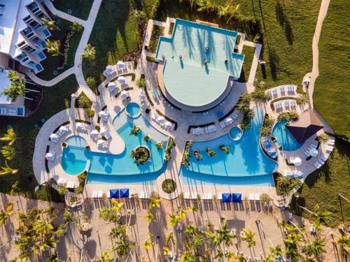 an overhead view of a swimming pool at a resort at Viva Miches by Wyndham, a Trademark All Inclusive Resort in Miches