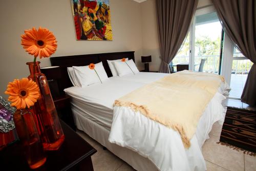 เตียงในห้องที่ Seaview Manor Exquisite Bed & Breakfast