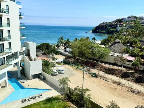 a view of the ocean from a building at Luxury Oceanview 2BR La Cruz de Huanacaxtle in Cruz de Huanacaxtle