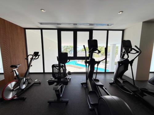 a gym with several exercise bikes in a room at Luxury Oceanview 2BR La Cruz de Huanacaxtle in Cruz de Huanacaxtle