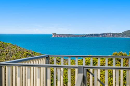 a balcony with a view of the ocean at Seascape Retreat at Bonny Hills in Bonny Hills
