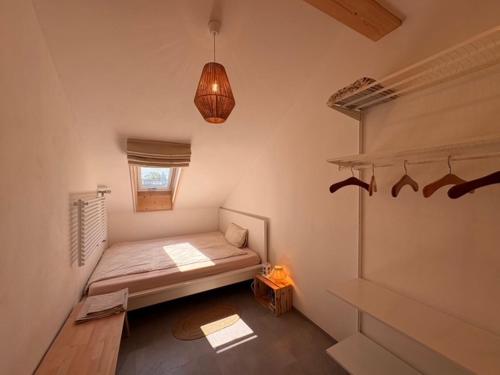 Postel nebo postele na pokoji v ubytování Ferienwohnung Balkonien