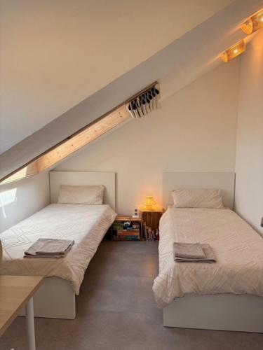 Postel nebo postele na pokoji v ubytování Ferienwohnung Balkonien