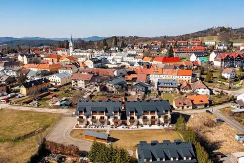 an aerial view of a small town with buildings at Studio Mavis in Kašperské Hory