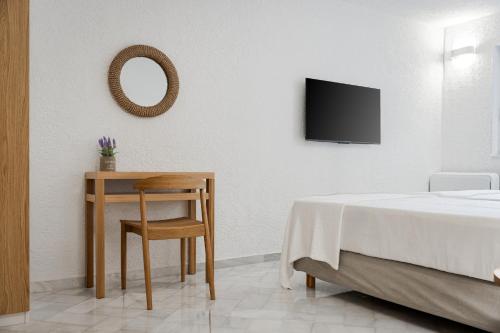 Телевизор и/или развлекательный центр в Sounio Sea Breeze Villa