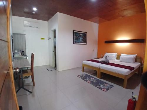 Postel nebo postele na pokoji v ubytování Sambag Hideaway Bungalows