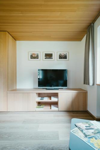 a living room with a flat screen tv at Haus Margreth in Mellau