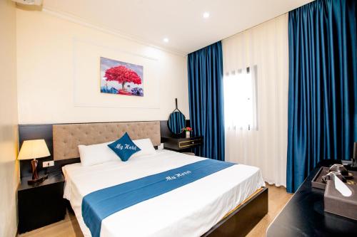 My Hotel Hạ Longにあるベッド