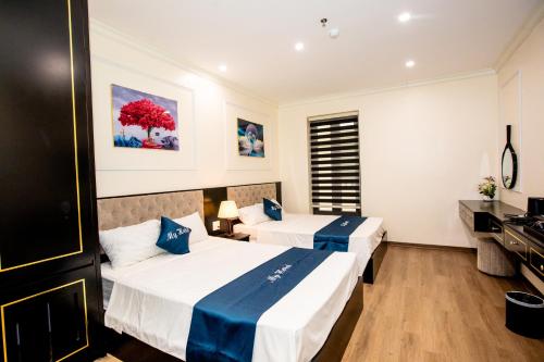My Hotel Hạ Longにあるベッド