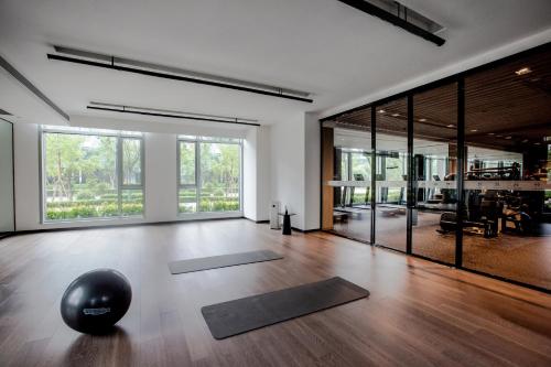 Das Fitnesscenter und/oder die Fitnesseinrichtungen in der Unterkunft ParcVue Hotel Residence Nanjing