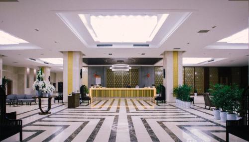 a rendering of the lobby of a hotel at Muong Thanh Luxury Nhat Le Hotel in Dong Hoi