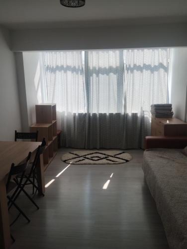 Χώρος καθιστικού στο 4 Rooms Apartment