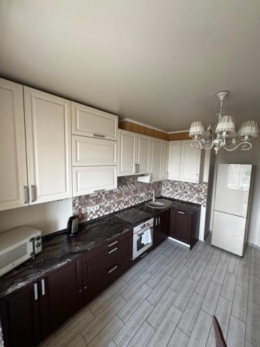 Η κουζίνα ή μικρή κουζίνα στο City Rooms Apartments
