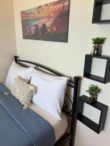 Postel nebo postele na pokoji v ubytování Koumpe Blue Sea View Apartment