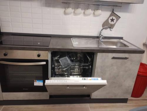 Η κουζίνα ή μικρή κουζίνα στο I Portici - Bergamo Apartment