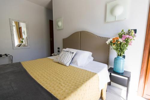 Un ou plusieurs lits dans un hébergement de l'établissement Hotel Ponte Sassi