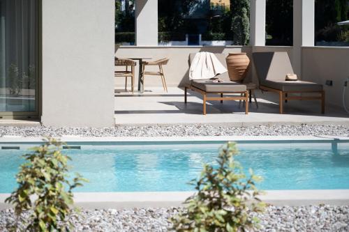 Πισίνα στο ή κοντά στο Eleagnos Villas