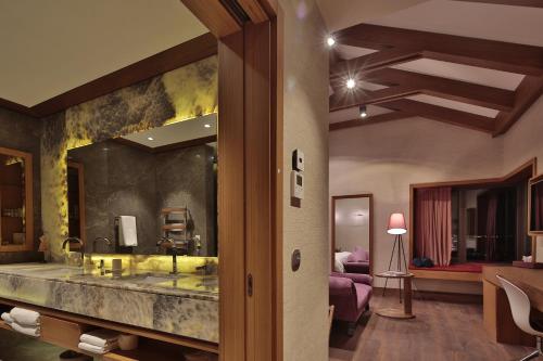 A bed or beds in a room at Ariana Sustainable Luxury Lodge - Special Category - Cappadocia