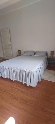 Ένα ή περισσότερα κρεβάτια σε δωμάτιο στο Maison Andon'ny Aina