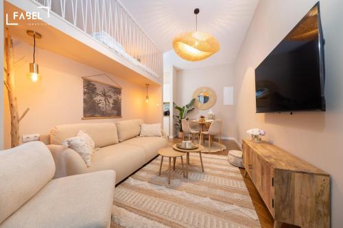 Televisyen dan/atau pusat hiburan di FABEL Apartments am Zoo