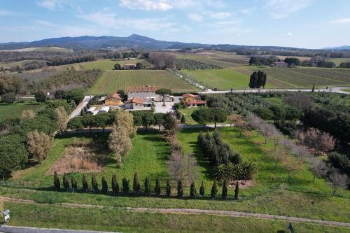 an aerial view of a house in a field with trees at Hotel Residence Vallecorsa in Vada
