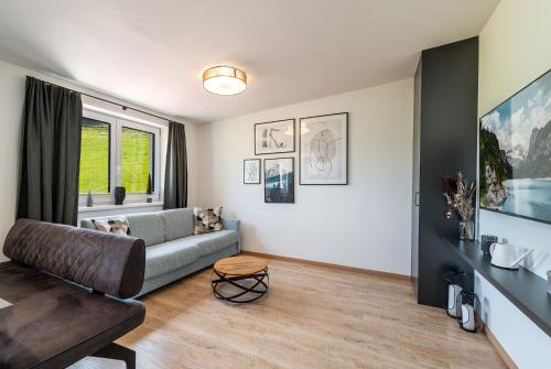 Ένα ή περισσότερα κρεβάτια σε δωμάτιο στο Mountain Love Appartements - by myNests