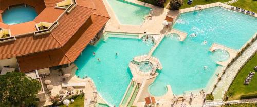 an overhead view of a large swimming pool at B&B Borgo Vera in Manciano