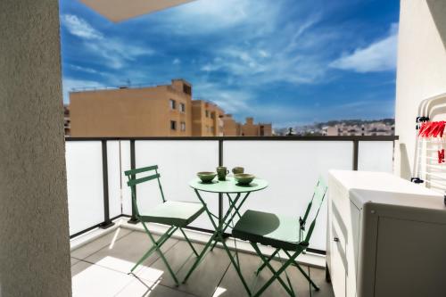 En balkon eller terrasse på Le Neoroch