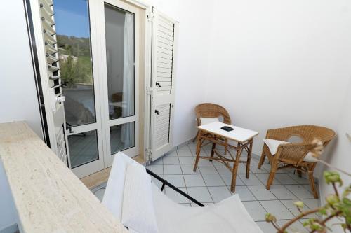 Balkón nebo terasa v ubytování Hotel Il Vascello