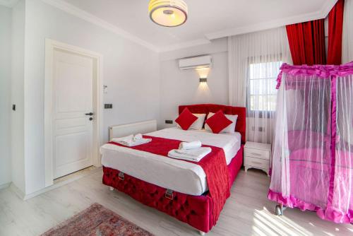 Ένα ή περισσότερα κρεβάτια σε δωμάτιο στο Villa Lux