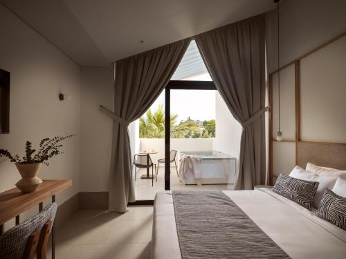 Cama ou camas em um quarto em Cavo Vezal
