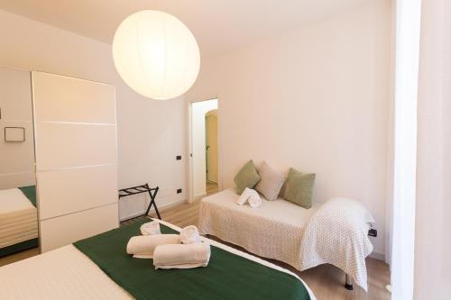 Una cama o camas en una habitación de Casa ITACA