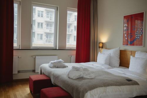 Postel nebo postele na pokoji v ubytování Home Hotel Mektagonen