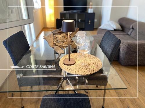 Posezení v ubytování CORTE SARDINA lungo la laguna di Sottomarina di Chioggia