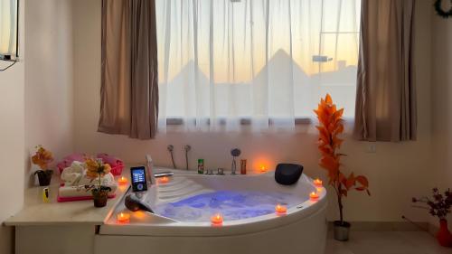 Fotografie z fotogalerie ubytování Luxury pyramids jacuzzi view inn v Káhiře