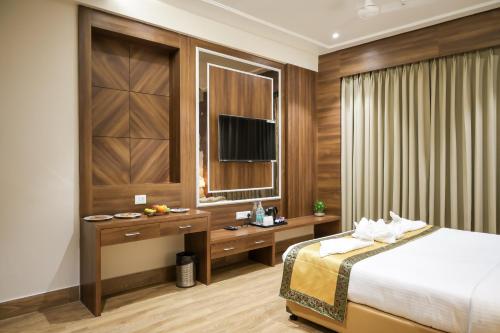 Hotel The Rising Banarasにあるベッド