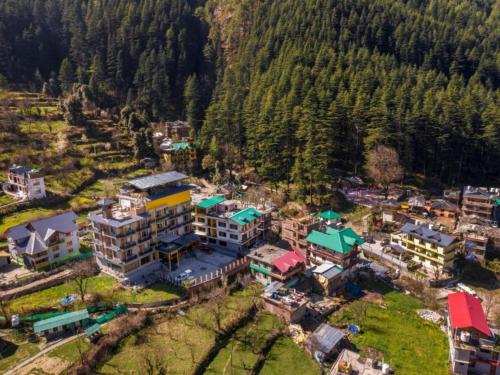 an aerial view of a resort in the mountains at The Hosteller Kasol, Parvati Valley in Kasol