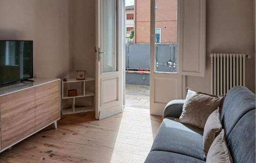 a living room with a couch and a television at 1 Bedroom Nice Apartment In Casalguidi in Cantagrillo
