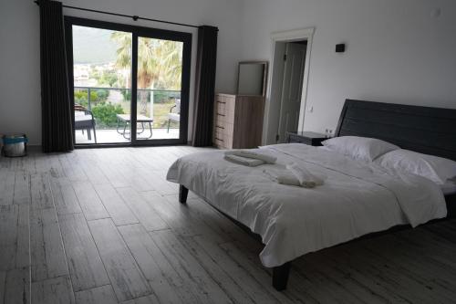 Ένα ή περισσότερα κρεβάτια σε δωμάτιο στο Villa Valencia By Luxury Group, Ölüdeniz, Private Pool