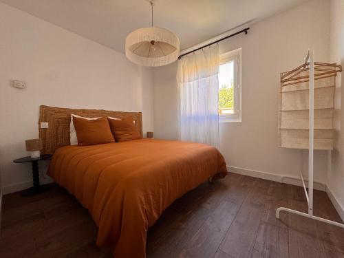 Postel nebo postele na pokoji v ubytování Petite maison à la campagne