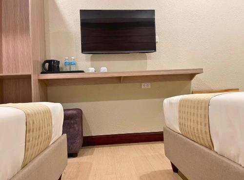 TV a/nebo společenská místnost v ubytování Sola Bed and Breakfast
