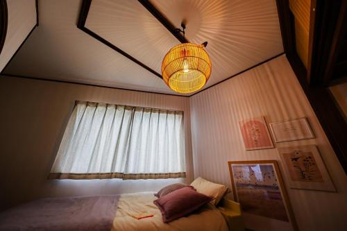 Katil atau katil-katil dalam bilik di tsugumi house つぐみ亭戸建て京成高砂駅