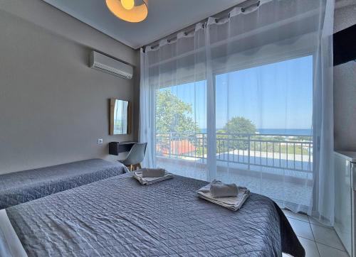 Postel nebo postele na pokoji v ubytování Hotel Thermaikos