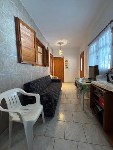 a living room with a couch and a table at Kyma Village House in Epanomi