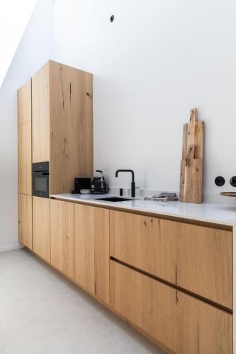 Dapur atau dapur kecil di Duinappartementen Schoorl