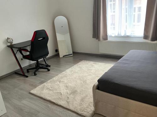 Katil atau katil-katil dalam bilik di Appartement confortable avec garage premier étage sans terrasse